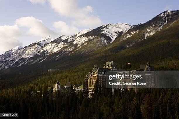 The Fairmont Banff Springs Hotel & Spa is seen in this 2010 Banff Springs, Canada, early morning landscape photo taken from cliff above the Bow River.