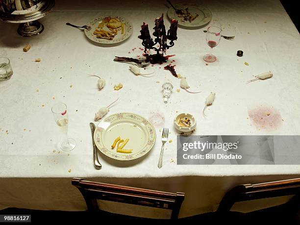 white mice on a dining room table  - messy table stock pictures, royalty-free photos & images