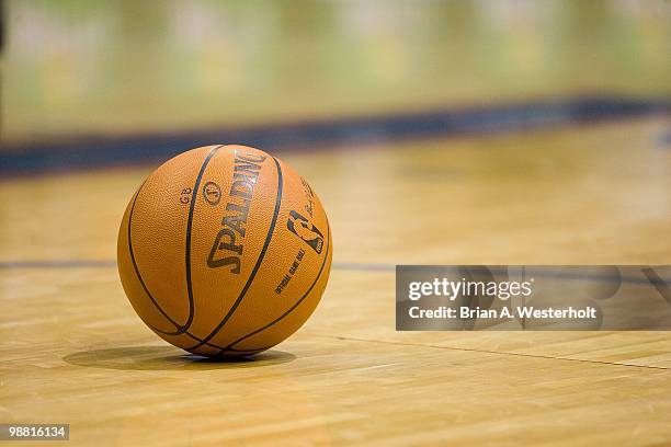 Spalding basketball sits on the court during a stoppage in play between the Orlando Magic and the Charlotte Bobcats at Time Warner Cable Arena on...