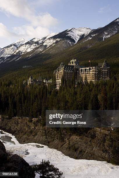 The Fairmont Banff Springs Hotel & Spa is seen in this 2010 Banff Springs, Canada, early morning landscape photo taken from cliff above a frozen Bow...