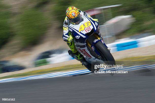 Valentino Rossi of Italy and Fiat Yamaha Team lifts the front wheel during the day of testing after Jerez GP at Circuito de Jerez on May 3, 2010 in...