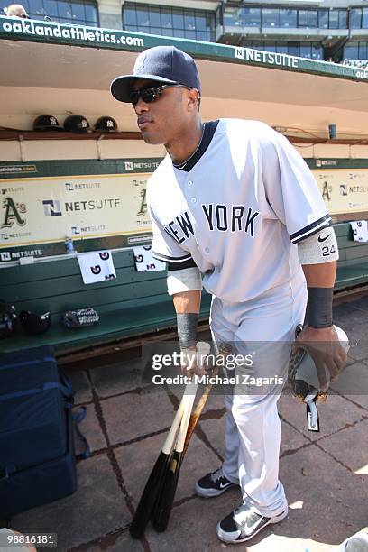 Robinson Cano of the New York Yankees standing in the dugout prior to the game against the Oakland Athletics at the Oakland Coliseum on April 22,...