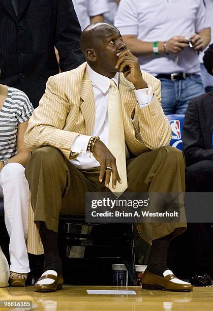 Charlotte Bobcats owner Michael Jordan looks at the video board during the game against the Orlando Magic at Time Warner Cable Arena on April 26,...