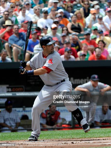 Firstbaseman Mike Lowell of the Boston Red Sox strides into a pitch during the top of the first inning of a game on May 2, 2010 against the Baltimore...