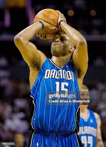Vince Carter of the Orlando Magic shoots a free throw against the Charlotte Bobcats at Time Warner Cable Arena on April 26, 2010 in Charlotte, North...