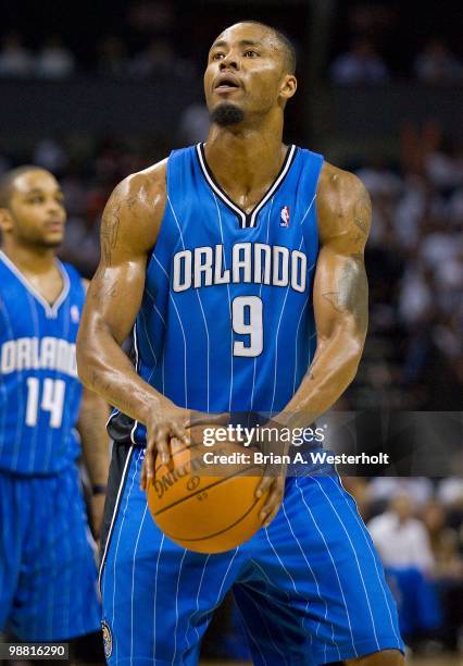 Rashard Lewis of the Orlando Magic shoots a free throw against the Charlotte Bobcats at Time Warner Cable Arena on April 26, 2010 in Charlotte, North...
