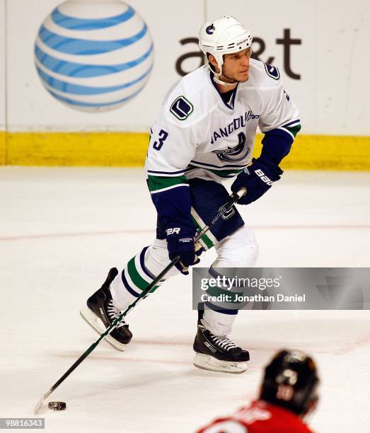 Kevin Bieksa of the Vancouver Canucks skates up the ice against the Chicago Blackhawks in Game One of the Western Conference Semifinals during the...