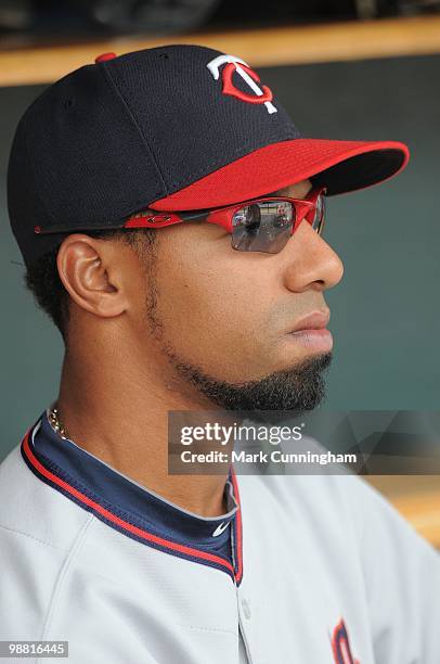 Alexi Casilla of the Minnesota Twins looks on from the dugout against the Detroit Tigers during the game at Comerica Park on April 29, 2010 in...