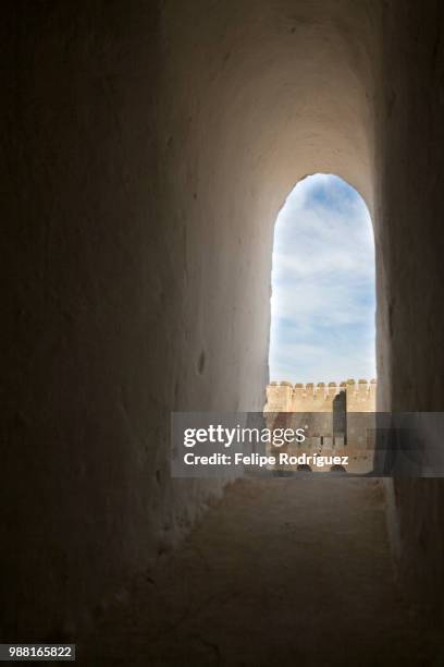loophole of the alcazaba, alhambra, granada, spain - alcazaba of alhambra stock pictures, royalty-free photos & images