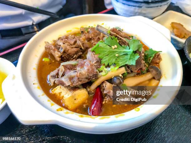 lamb spine spicy stew served at chinese restaurant in japan - lamb stew stock pictures, royalty-free photos & images