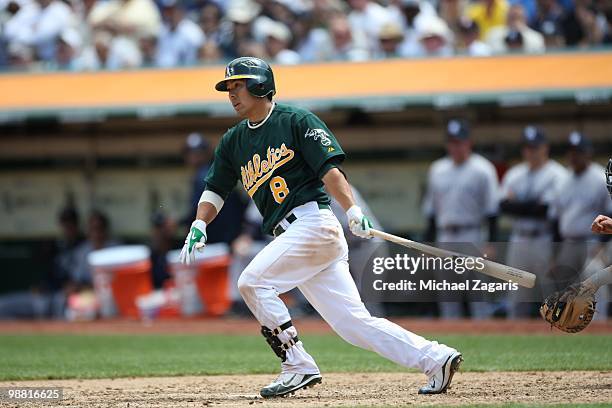 Kurt Suzuki of the Oakland Athletics hitting into a triple play during the game against the New York Yankees at the Oakland Coliseum on April 22,...