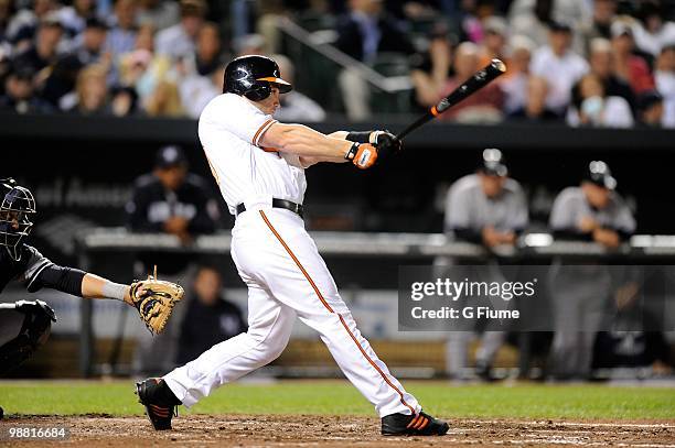 Luke Scott of the Baltimore Orioles bats against the New York Yankees at Camden Yards on April 29, 2010 in Baltimore, Maryland.