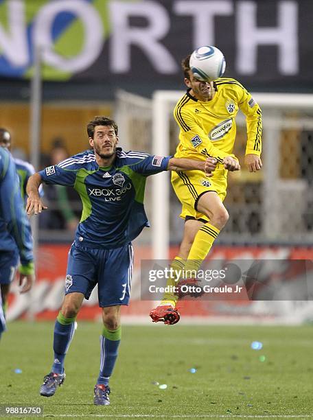 Eric Brunner of the Columbus Crew in action against Brad Evans of the Seattle Sounders FC on May 1, 2010 at Qwest Field in Seattle, Washington.