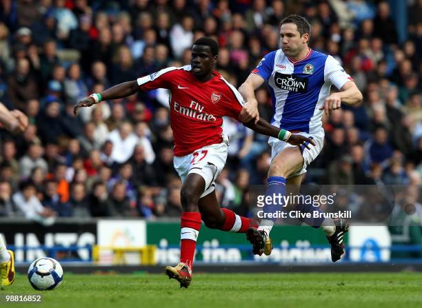 Emmanuel Eboue of Arsenal moves away from David Dunn of Blackburn Rovers during the Barclays Premier League match between Blackburn Rovers and...