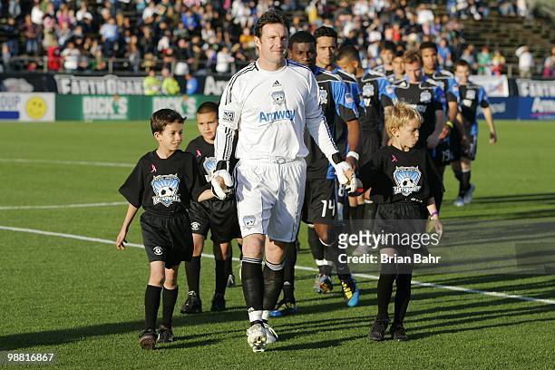 Goalie Joe Cannon of the San Jose Earthquakes leads young soccer players onto the field before a game against the Colorado Rapids on May 1, 2010 at...