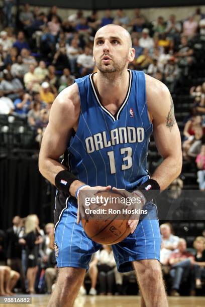 Marcin Gortat of the Orlando Magic sets up for a free throw against the Indiana Pacers during the game at Conseco Fieldhouse on April 12, 2010 in...