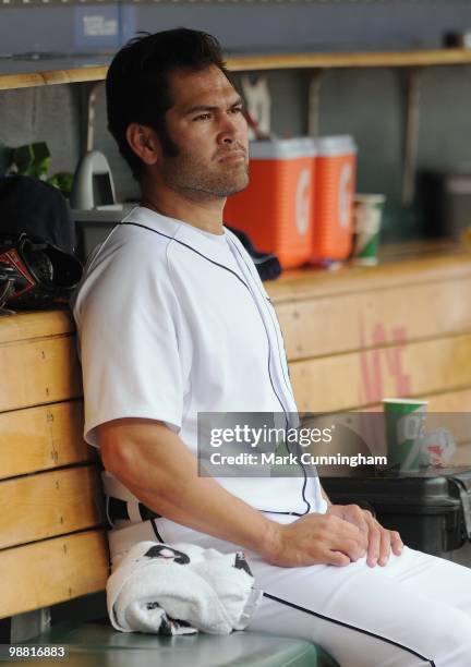 Johnny Damon of the Detroit Tigers looks on from the dugout against the Los Angeles Angels of Anaheim during the game at Comerica Park on May 2, 2010...