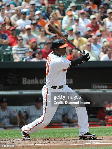 Outfielder Adam Jones of the Baltimore Orioles singles to rightfield during the bottom of the first inning of a game on May 2, 2010 against the...