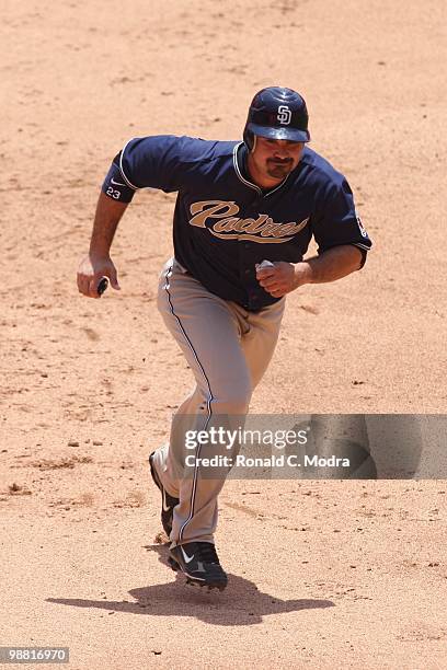 Adrian Gonzalez of the San Diego Padres runs to third base during a MLB game against the Florida Marlins in Sun Lite Stadium on April 28, 2010 in...