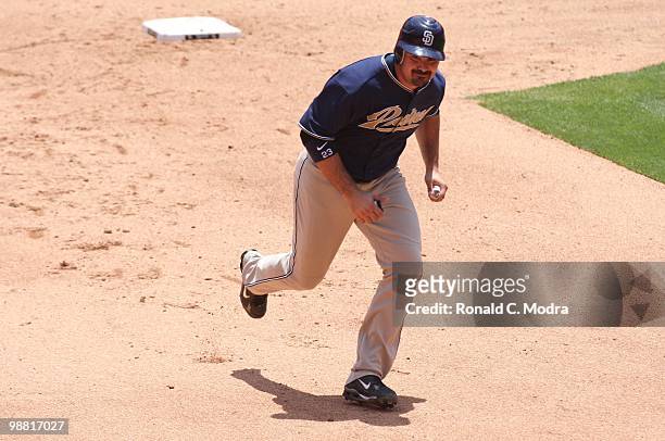 Adrian Gonzalez of the San Diego Padres runs to third base during a MLB game against the Florida Marlins in Sun Lite Stadium on April 28, 2010 in...
