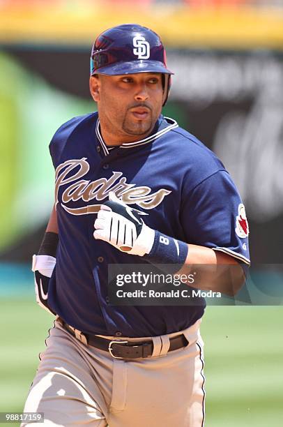 Yorvit Torrealba of the San Diego Padres circles the bases after hitting a home run during a MLB game against the Florida Marlins in Sun Lite Stadium...