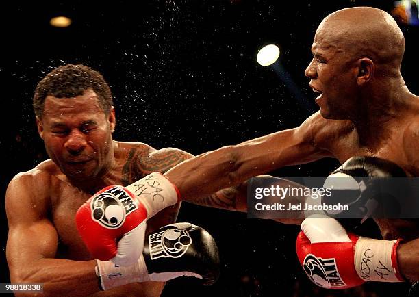 Floyd Mayweather Jr. Throws a right to the head of Shane Mosley during their welterweight fight at the MGM Grand Garden Arena on May 1, 2010 in Las...