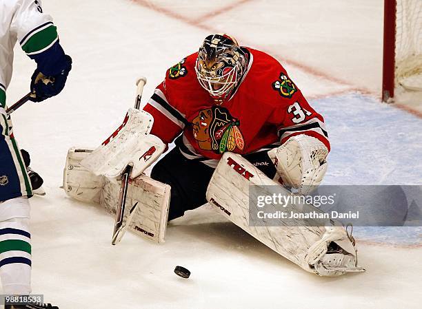 Antti Niemi of the Chicago Blackhawks makes a save against the Vancouver Canucks in Game One of the Western Conference Semifinals during the 2010 NHL...