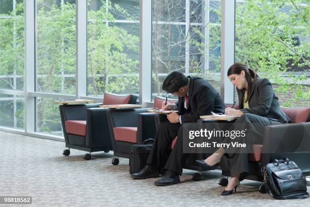 business people filling out job applications - terry fair stock pictures, royalty-free photos & images