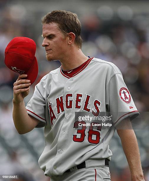 Jered Weaver of the Los Angeles Angels of Anaheim reacts after leaving the game in the sixth inning inning against the Detroit Tigers during the game...