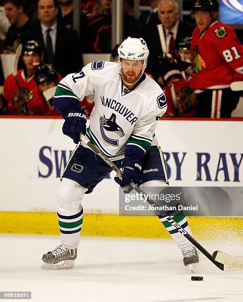 Daniel Sedin of the Vancouver Canucks looks to pass against the Chicago Blackhawks in Game One of the Western Conference Semifinals during the 2010...