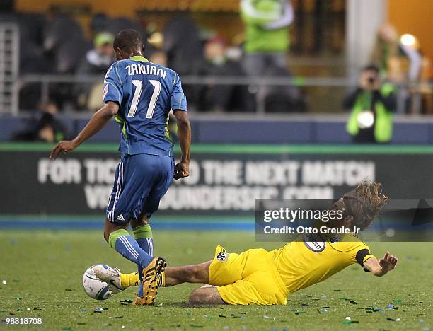 Steve Zakuani of the Seattle Sounders FC battles Frankie Hejduk of the Columbus Crew on May 1, 2010 at Qwest Field in Seattle, Washington.