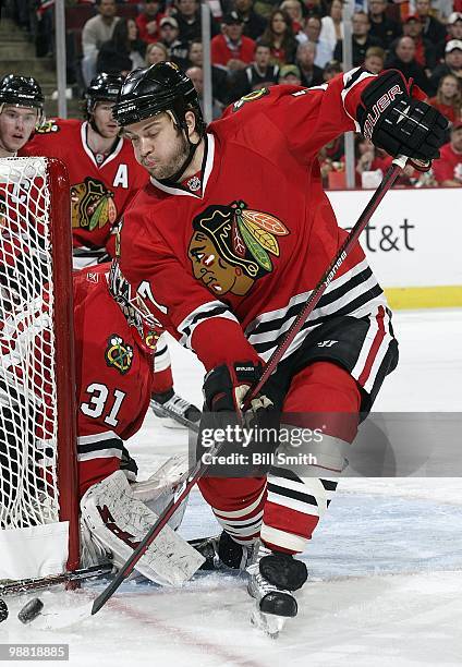 Brent Seabrook of the Chicago Blackhawks chases the puck around the net at Game Two of the Western Conference Quarterfinals against the Nashville...