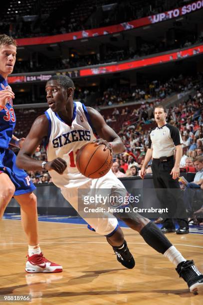 Jrue Holiday of the Philadelphia 76ers dribble drives to the basket against the Detroit Pistons during the game at Wachovia Center on April 6, 2010...