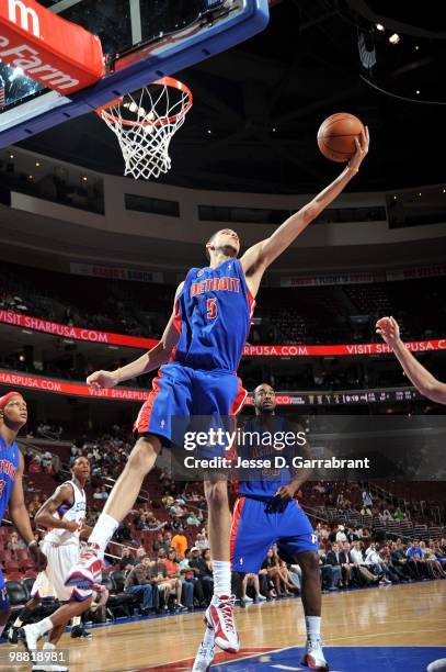 Austin Daye of the Detroit Pistons rebounds a loose ball against the Philadelphia 76ers during the game at Wachovia Center on April 6, 2010 in...