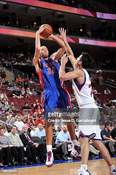 Tayshaun Prince of the Detroit Pistons shoots the fall away jump shot against Jason Kapono of the Philadelphia 76ers during the game at Wachovia...