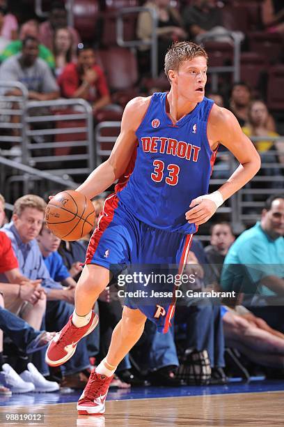 Jonas Jerebko of the Detroit Pistons dribbles the ball upcourt against the Philadelphia 76ers during the game at Wachovia Center on April 6, 2010 in...