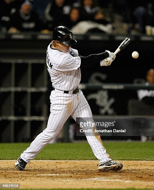 Gordon Beckham of the Chicago White Sox swings at the ball against the Tampa Bay Rays at U.S. Cellular Field on April 21, 2010 in Chicago, Illinois....