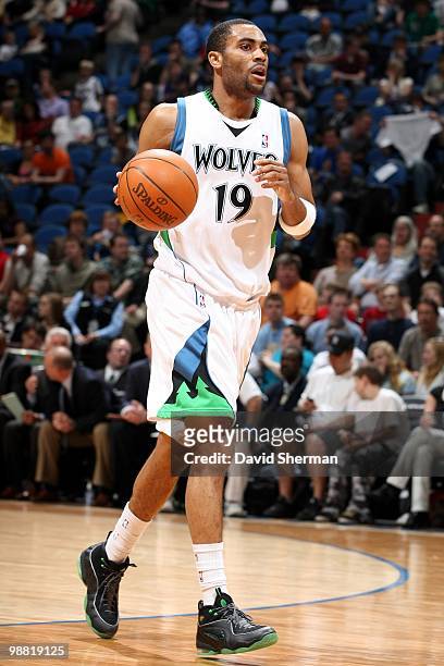 Wayne Ellington of the Minnesota Timberwolves dribbles the ball upcourt against the Detroit Pistons during the game at Target Center on April 14,...