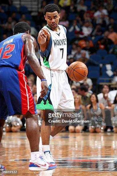 Ramon Sessions of the Minnesota Timberwolves sets up a play on the dribble against Will Bynum of the Detroit Pistons during the game at Target Center...
