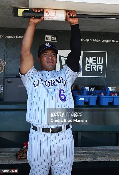 Melvin Mora of the Colorado Rockies gets ready in the dugout before the game between the Colorado Rockies and the San Francisco Giants on Sunday, May...