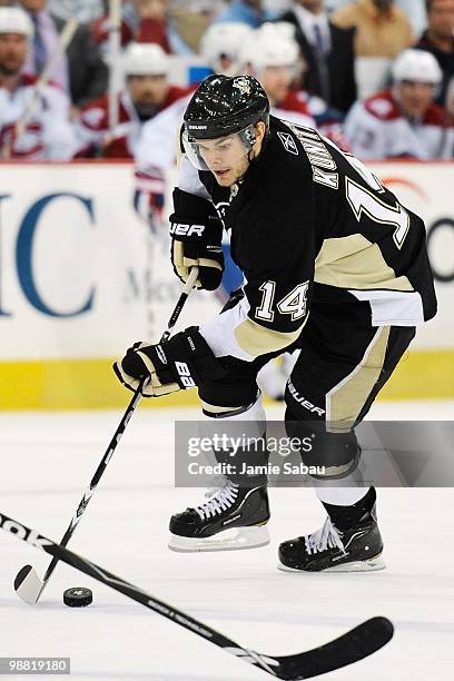 Chris Kunitz of the Pittsburgh Penguins skates with the puck against the Montreal Canadiens in Game One of the Eastern Conference Semifinals during...