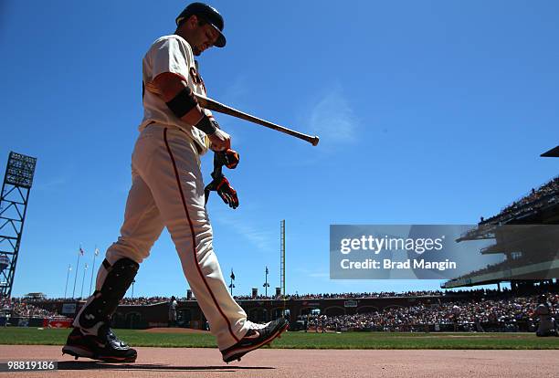 Aaron Rowand of the San Francisco Giants walks to the on deck circle during the game between the Colorado Rockies and the San Francisco Giants on...