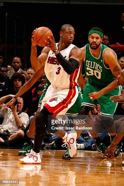 Dwyane Wade of the Miami Heat looks to pass against Rasheed Wallace of the Boston Celtics in Game Three of the Eastern Conference Quarterfinals...