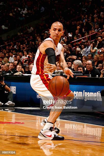 Carlos Arroyo of the Miami Heat passes the ball in Game Three of the Eastern Conference Quarterfinals against the Boston Celtics during the 2010 NBA...