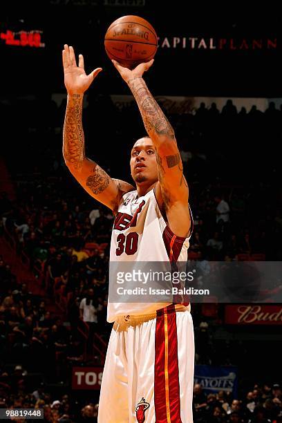 Michael Beasley of the Miami Heat shoots a free throw in Game Three of the Eastern Conference Quarterfinals against the Boston Celtics during the...
