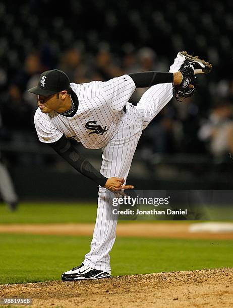 Sergio Santos of the Chicago White Sox follows through after throwing a pitch against the Tampa Bay Rays at U.S. Cellular Field on April 21, 2010 in...