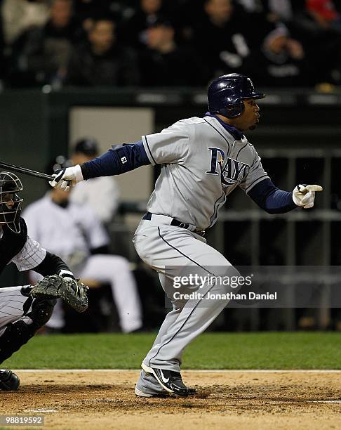 Carl Crawford of the Tampa Bay Rays hits the ball against the Chicago White Sox at U.S. Cellular Field on April 21, 2010 in Chicago, Illinois. The...