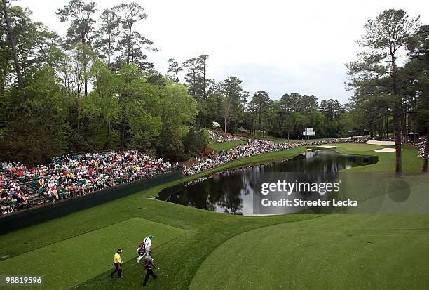 Tiger Woods and K.J. Choi walk to the 16th green during the first round of the 2010 Masters Tournament at Augusta National Golf Club on April 8, 2010...