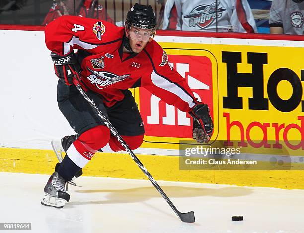 Taylor Hall of the Windsor Spitfires skates up ice with the puck in the third game of the OHL Championship final against the Barrie Colts on May...