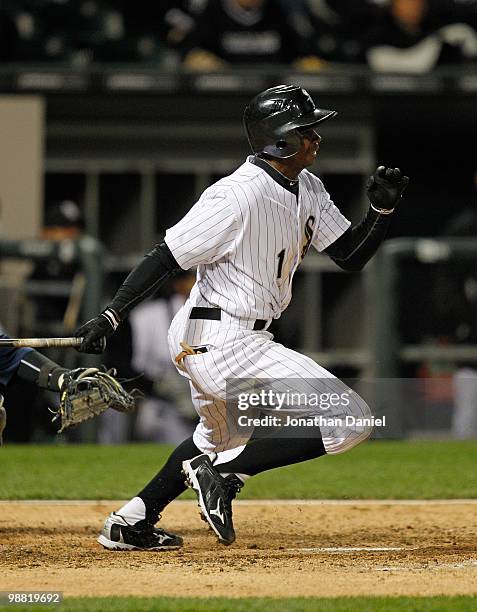 Juan Pierre of the Chicago White Sox runs after hitting the ball against the Tampa Bay Rays at U.S. Cellular Field on April 21, 2010 in Chicago,...
